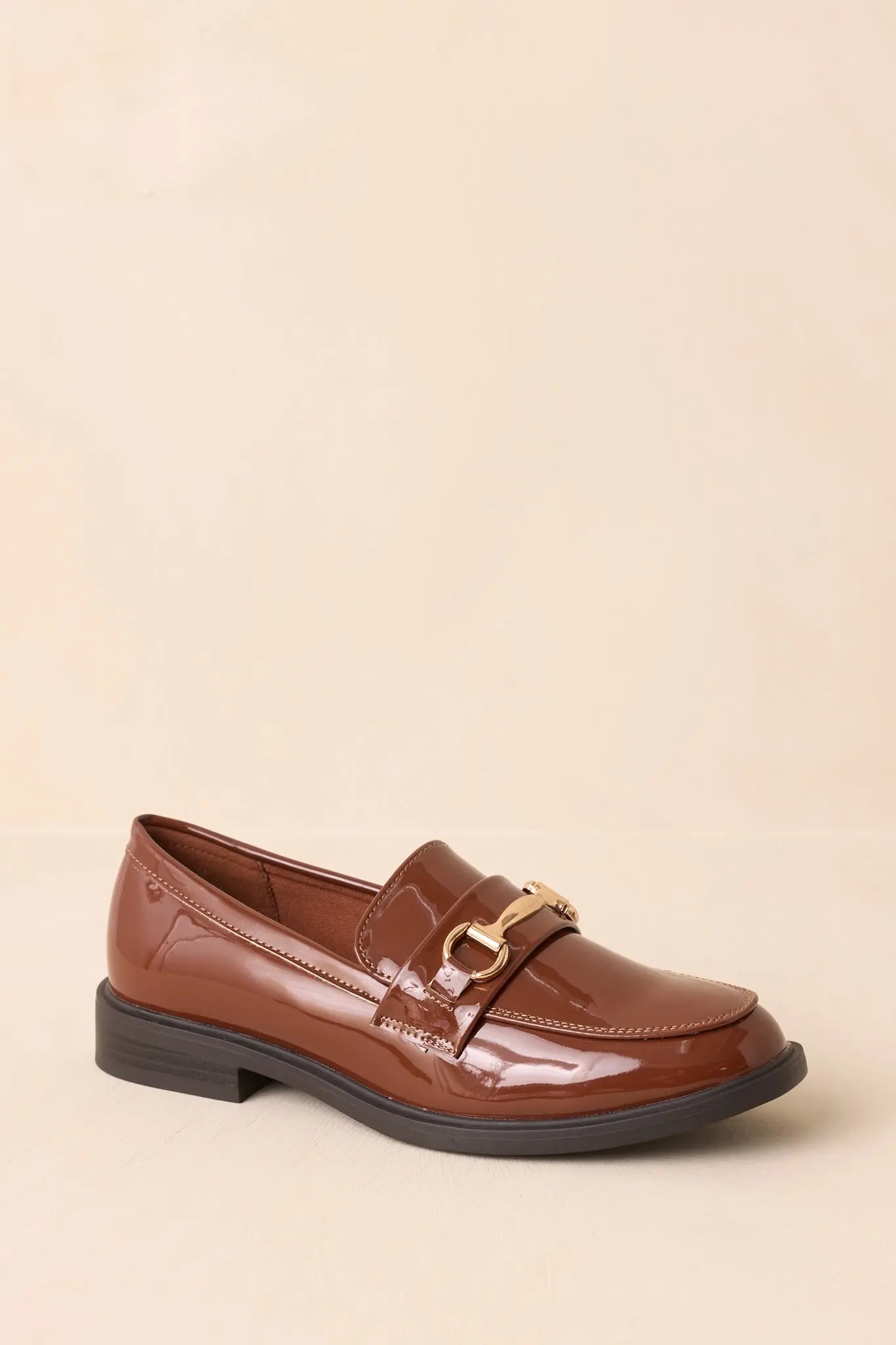 Women's It All Made Sense Brown Patent Faux Leather Loafers | Heel measures 1" 5