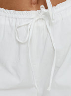 Women's Kissed Chaos Broderie Anglais Tie Waist Pants White | Tie-waist pants in broderie anglaise print 5